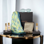Chokore Chokore Special 2-in-1 Gift Set for Her(Pink and Purple Silk Scarf & 20 ml Enchanted Perfume)Her (Printed Stole & 20 ml Scandalous Perfume) Chokore Special 4-in-1 Gift Set for Her (Silk Stole, Scarf, Sunglasses, & Perfumes Combo)