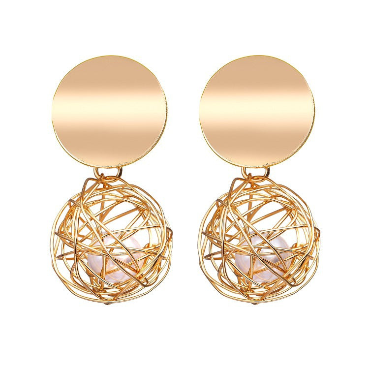 Drop Earrings with a woven metal mesh ball and pearl. Gold tone.