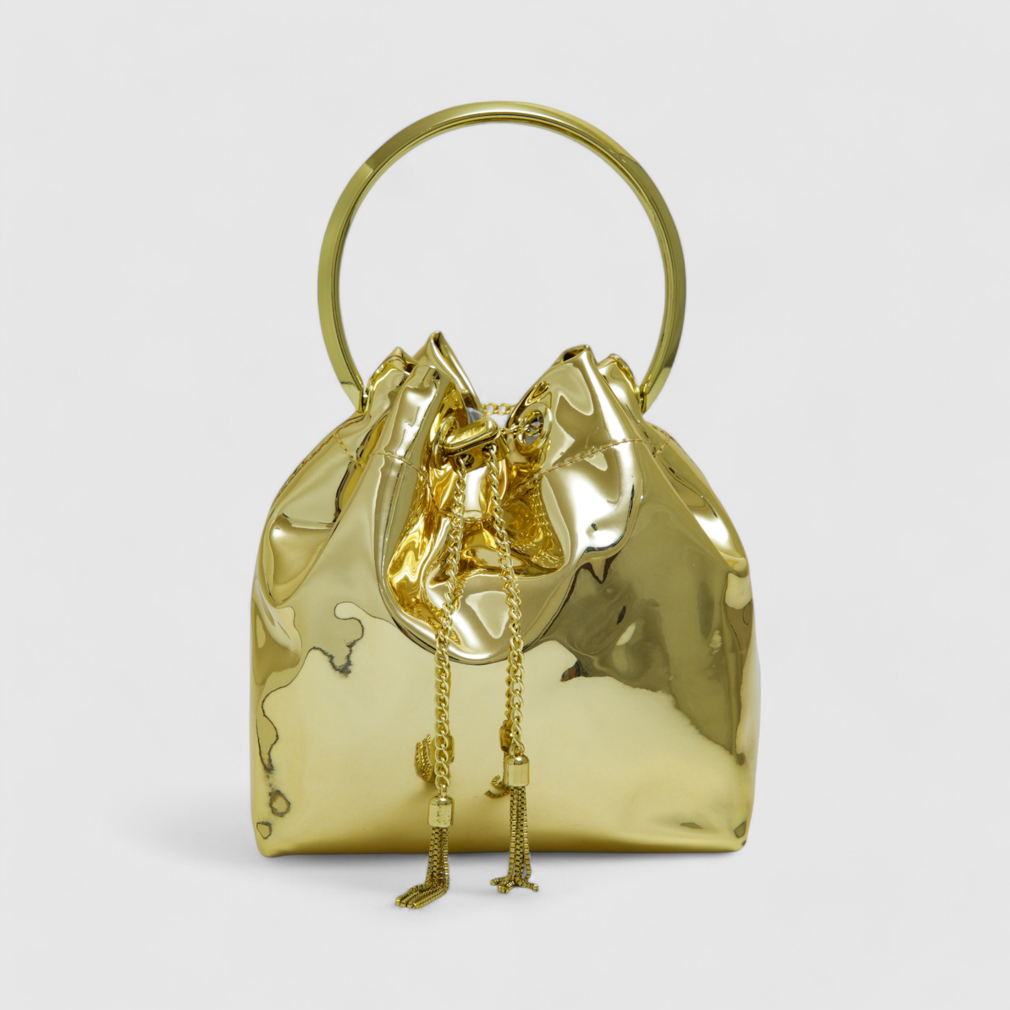chokore Chokore Gold Tassel Potli Bag (Golden)